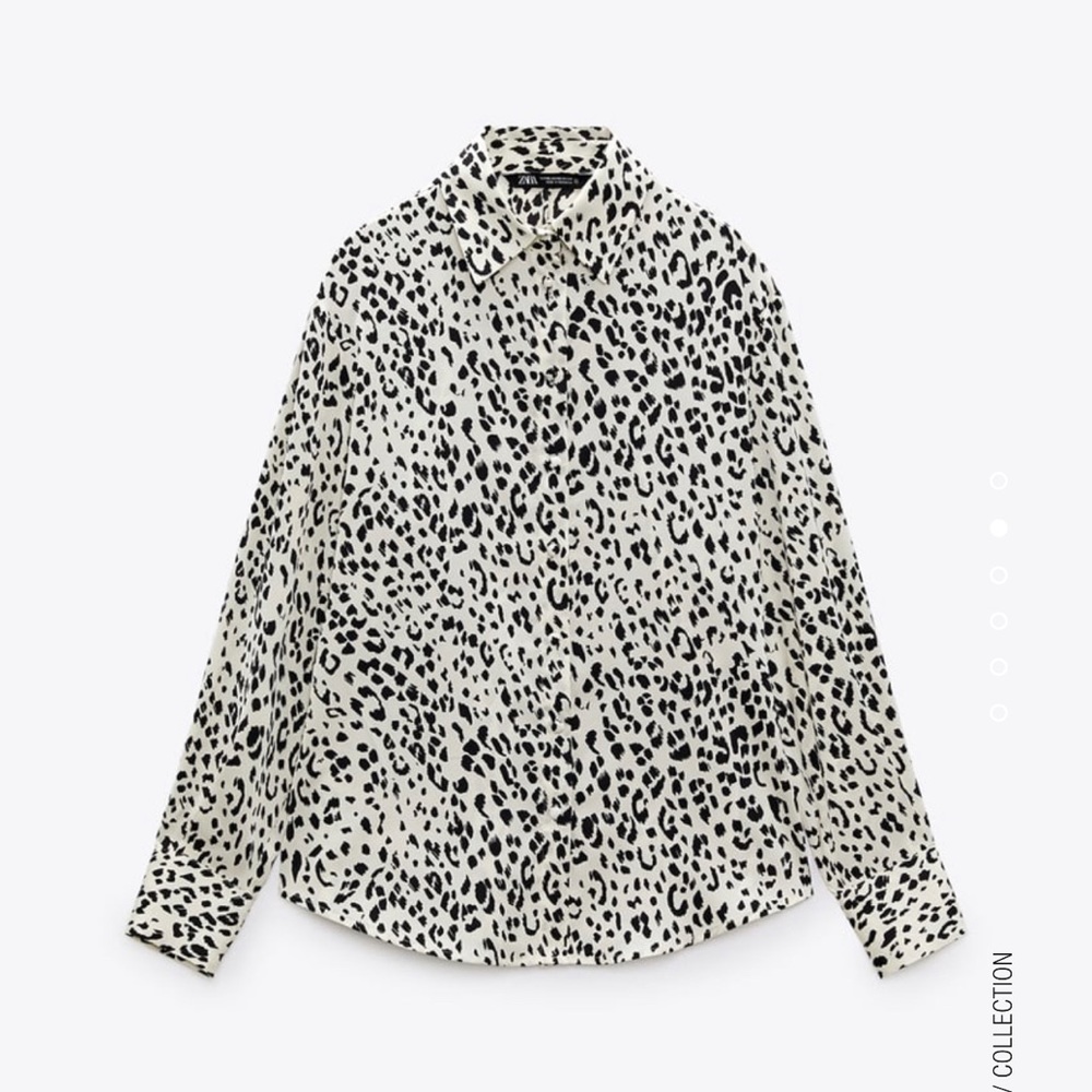 Lapel collar, long sleeve animal print blouse. New with tags. Polyester material